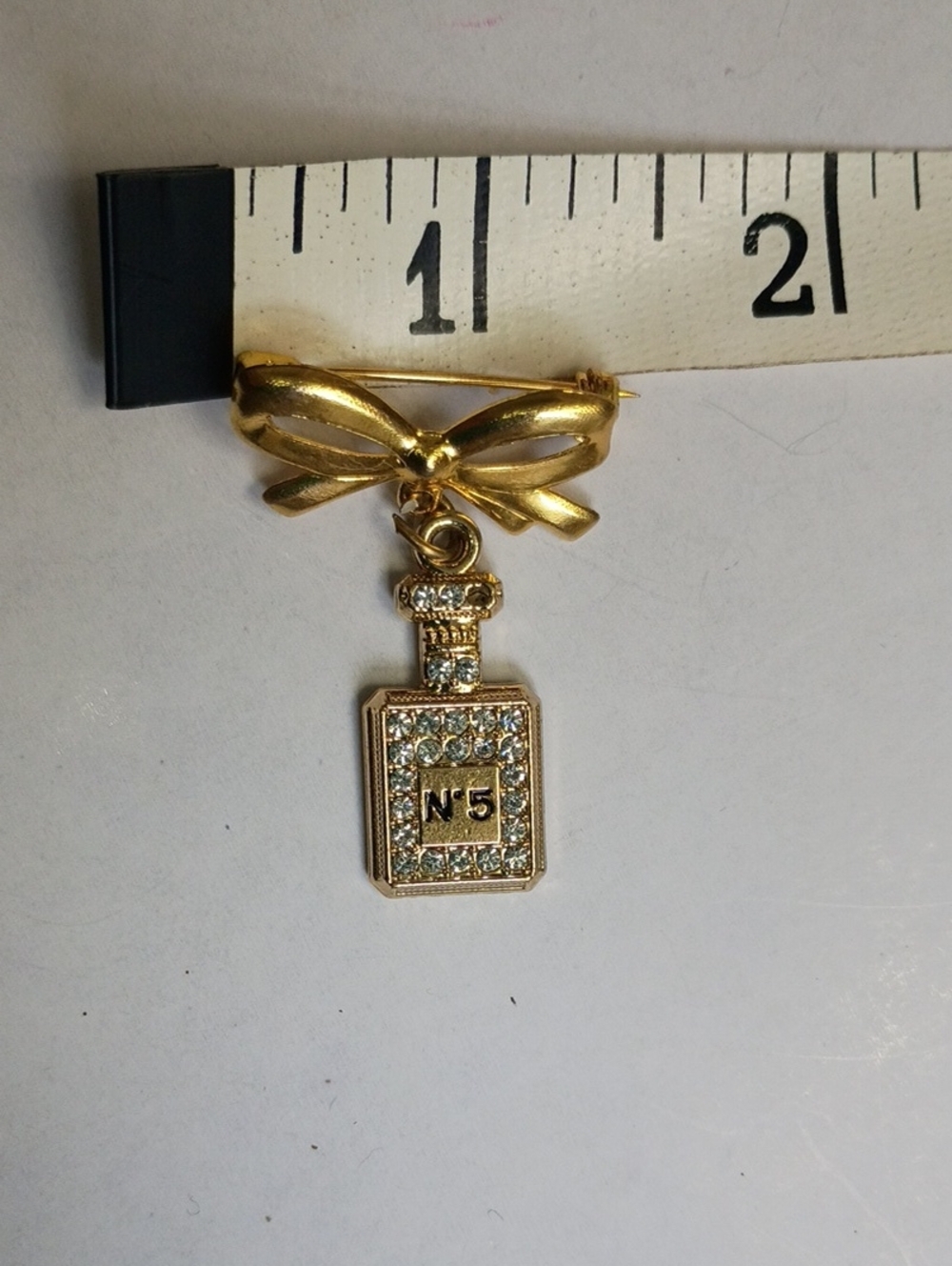 Gold Bow Brooch with Crystal-Encrusted Perfume Bottle Charm (Nº5) - Picture 8 of 10